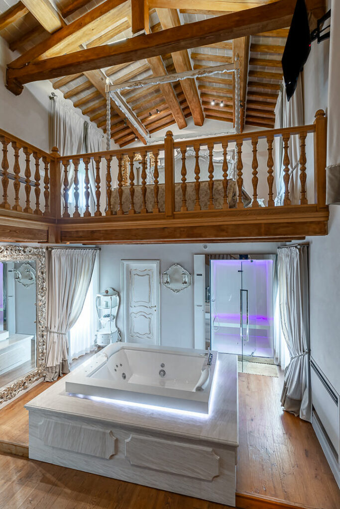 Fotografo Hotel Resort immagine interno camera con SPA